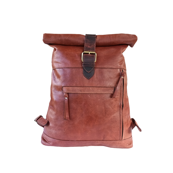 "Rucksack de cuero marrón oscuro" puede reescribirse como "Rucksack de cuero marrón en tono oscuro".